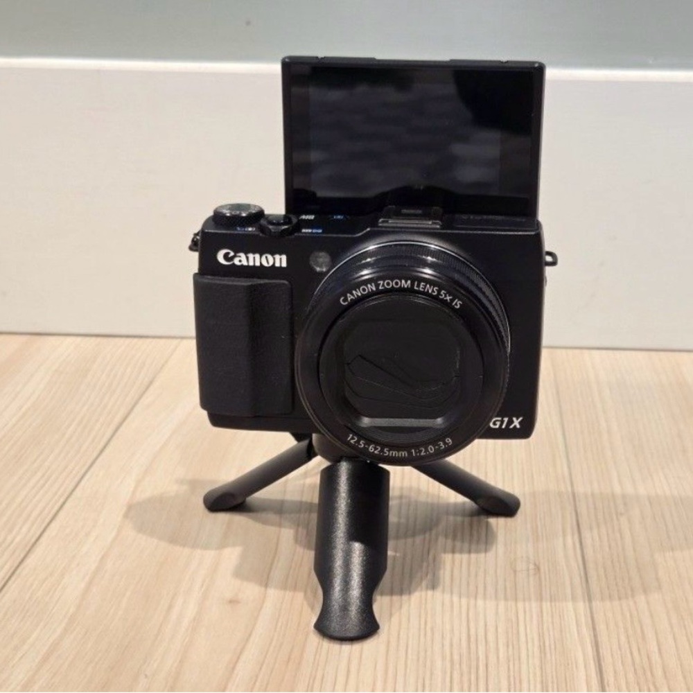 Canon Powershot G1X Mark II (step above
G7X and G9X), underwater case
